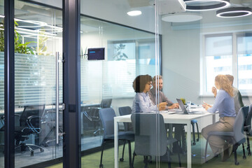 Business office with blurred people casual wear, with blurred bokeh background