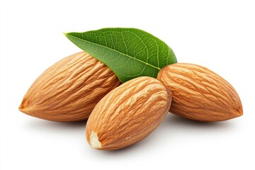 Three almonds with a green leaf.