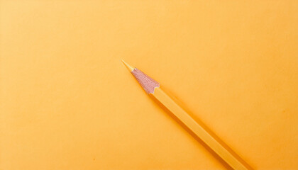 Yellow crayon drawing pencil writing on yellow background for art designer
