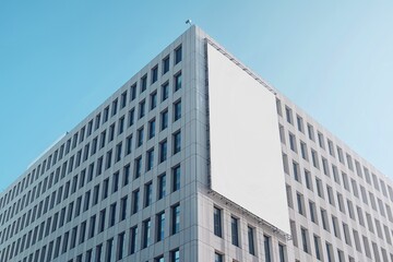 Obraz premium a modern, tall building with a gray facade