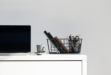 Laptop With Coffee Cup On Desk. Minimalistic workplace.