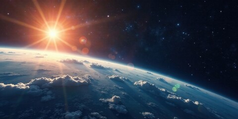 Fototapeta premium A Stunning Sunrise Over a Cloud-Covered Planet, Viewed From Orbit, Showing the Vastness of Space and the Beauty of Earth's Atmosphere