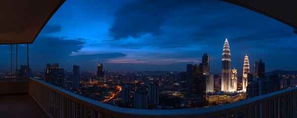 Fototapeta premium A panoramic view of a city skyline during the night