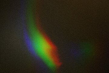 Abstract blurred colorful lens flare bokeh on black