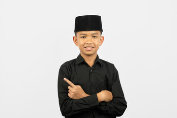 Confident Islamic Student Pointing with Folded Arms