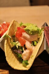 Tex-Mex cuisine (Mexican cuisine): shrimp and avocado taco