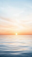Fototapeta premium A beautiful sunset over the ocean with a calm and peaceful mood