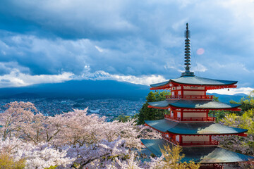 Fujiyoshida, Yamanashi, Japan - APR 17, 2024: Arakura Fuji Sengen Jinja Shrine. Mt Fuji with red pagoda in cherry blossom sakura in spring season .