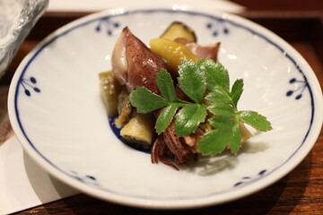 Japanese cuisine: firefly squid with razor clams and burdock in Tokyo, Japan