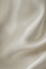 Fototapeta premium White sepia beige nude white abstract background. Silk satin fabric. Curtain drapery flowing line stripe. Color gradient. Beautiful elegant