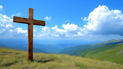 The tall Christian Catholic cross on the rolling hills symbolizes faith and hope, casting a peaceful and tranquil presence over the expansive landscape