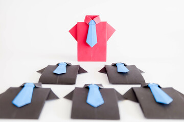 Business Concept Battle, Red Suit Wins, Black Suit Loses.