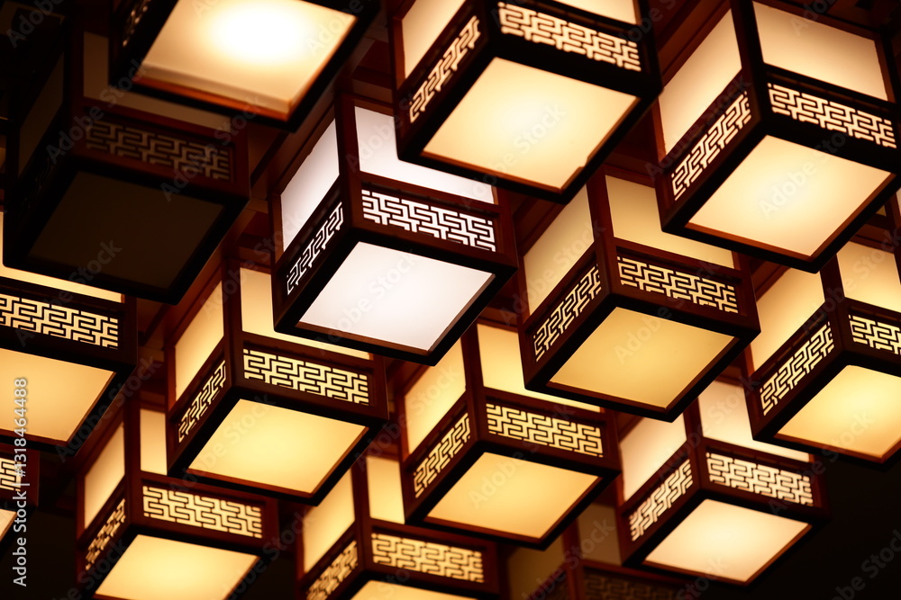 Poster a ceiling with multiple lights suspended from above, often used in commercial or residential spaces.