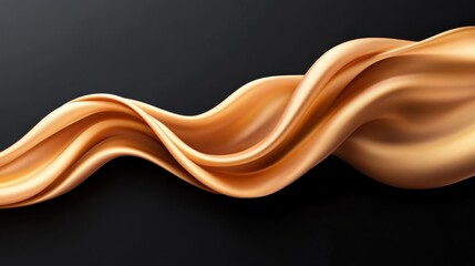 Obraz premium A smooth, flowing fabric wave in a warm caramel hue against a dark background, creating a sense of elegance and movement.