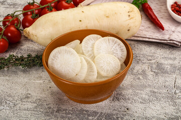 Sliced white daikon radish in the bowl