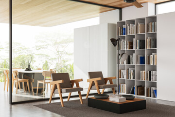 Modern living room with wooden chairs and bookshelf. 3D Rendering