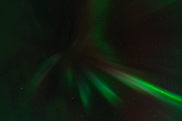 Elsgnes, Harstad, Hinnøya, Norway - 25 February 2025 - The fantastic rays of the Northern Lights in the Norwegian sky