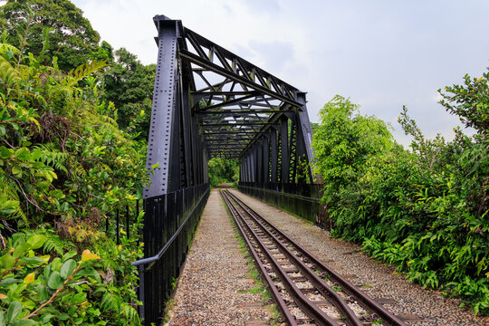 Old railway bridge Bukit Timah Truss Bridge at Rail Corridor hiking path in Singapore