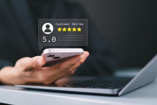 Customer review good rating concept, woman using a smartphone to view a 5-star customer review. positive customer feedback, testimonial and testimony, user comment and feedback for review.