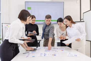 Group of business people working plan analysis at desk in modern office, Documents discussion analysis data the charts graphs, Business financial information and accountant concept.