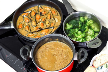 Healthy food. Nutrition. Cooking lentils, mussels, and broccoli.