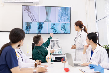 Fototapeta premium Team of doctor with human model and orthopedic surgeon, Healthcare and medical concept.