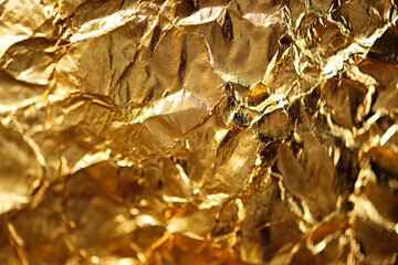 Shimmering Gold Foil Textured Background for Elegance and Luxury