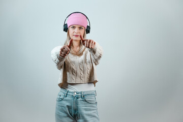 Young woman in pink cap with radiant smile, cheerful expression, and fresh, modern fashion vibe