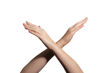 Crossing hands in an X shape, symbolizing refusal, prohibition, and denial. Stop gesture, rejection sign, and warning concept. Isolated on white background..