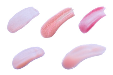 Collection of strokes of nail polish, lip gloss or lipstick isolated on white background. Different shades of pink