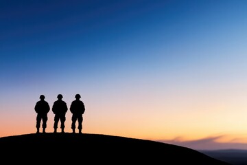 Silhouetted soldiers stand against vibrant sunset, symbolizing h