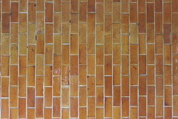 Wide cream brick wall with beige, old brown brick and limestone textures, perfect for abstract backgrounds
