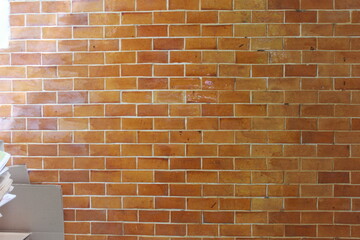 Wide cream brick wall with beige, old brown brick and limestone textures, perfect for abstract backgrounds
