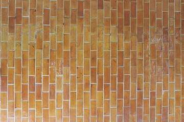 Wide cream brick wall with beige, old brown brick and limestone textures, perfect for abstract backgrounds
