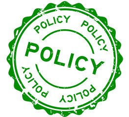 Grunge green policy word round rubber seal stamp on white background