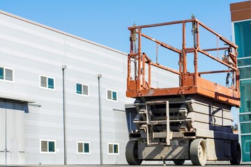 asphalt, black, building, buildings, business, cabin, cargo, city, commercial, construction, day, driver, duty, engineering, equipment, factory, forklift, forks, green, heavy, idle, industrial, indust