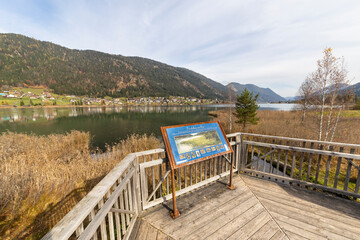 Idyllic viewpoint at lake Weissensee in Austria. Beautiful autumn day in Carinthia.