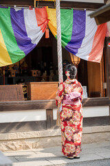 Woman wearing Kimono in Kyoto, Japan. Japanese traditional background.