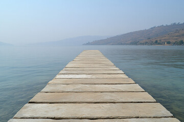 Fototapeta premium A serene view of Sukhna Lake, India, calm waters, peaceful atmosphere