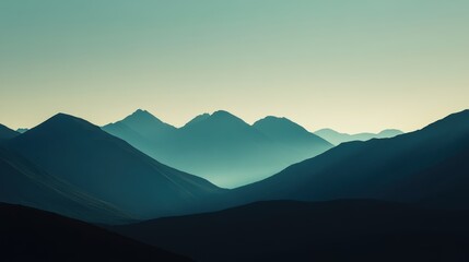 Serene mountain range at dawn.