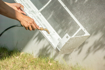 air conditioning cleaning service with water spray