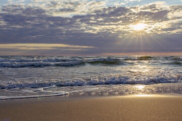 Sunset on the Baltic Sea coast in the Curonian Spit, Lithuania - 20.07.2024