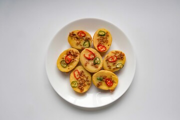 Traditional Malay cake known as Kuih Cara Berlauk.