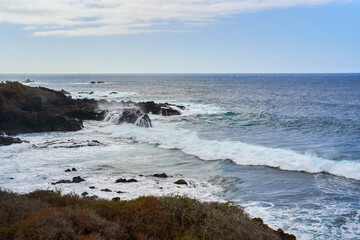 Rocky coastline with crashing waves