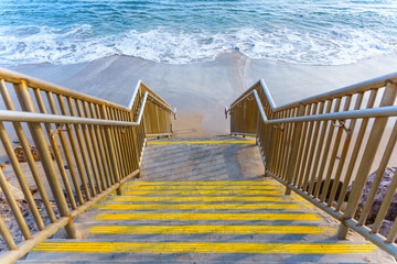 Captivating View of Staircase Leading to Malibu Beach and Calm Waters