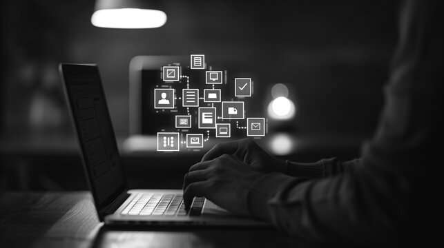 Digital Workflow: A person immersed in a digital workflow, typing on a laptop. Digital icons representing various aspects of data processing and modern technology float above the computer screen.