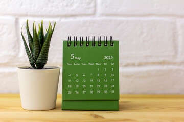 Hello May, desk calendar for planning May 2025.