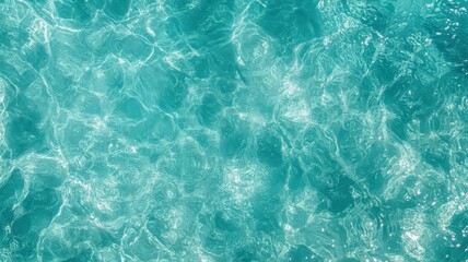 Obraz premium Abstract Turquoise Water Texture: Ripples and Light Reflections