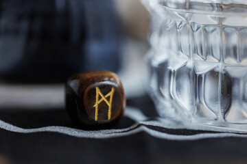 ehwaz rune on dark background