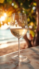 Obraz premium white wine in a chilled wine glass at the bar on the beach